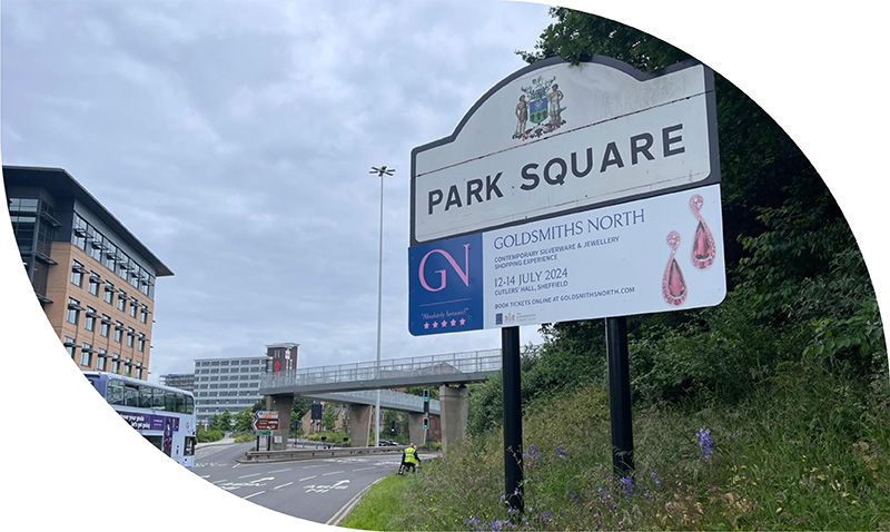 Advertising sign at Park Square roundabout