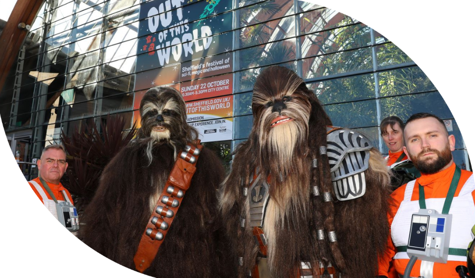 Two people are dressed as Wookies from Star Wars and two people dressed as Ghostbusters at Out of This World in Sheffield