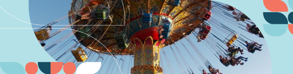 People in mid air on a swing carousel ride
